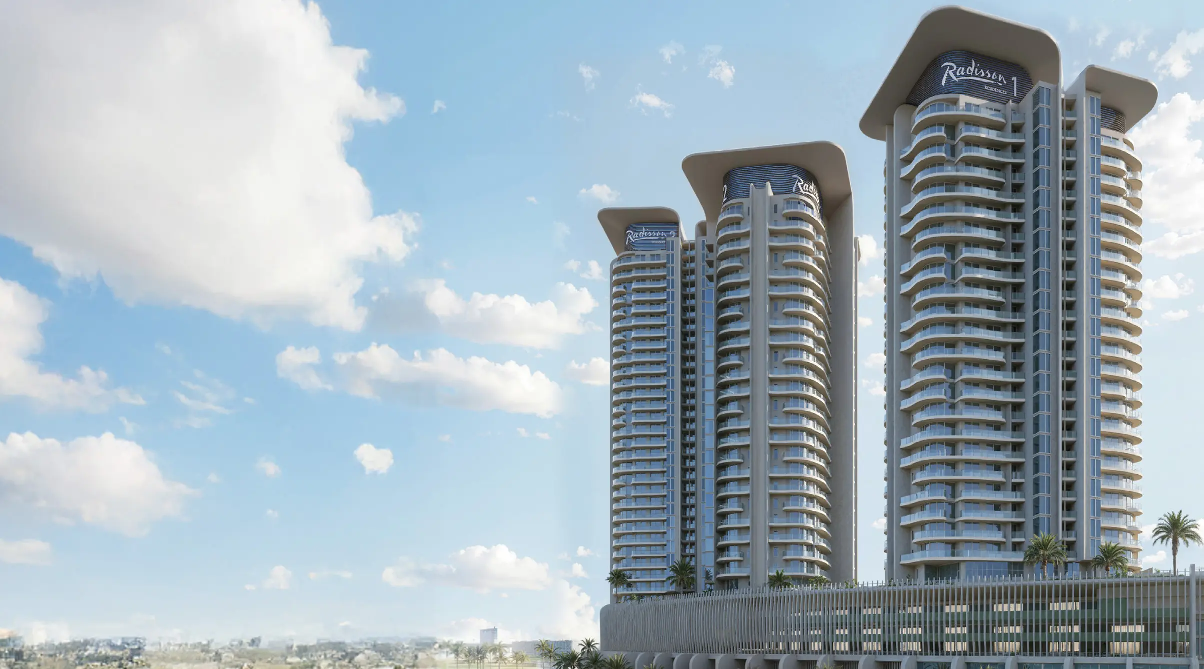 Radisson Residences Al Reem Island Abu Dhabi waterfront towers with landscaped podium and panoramic mangrove views